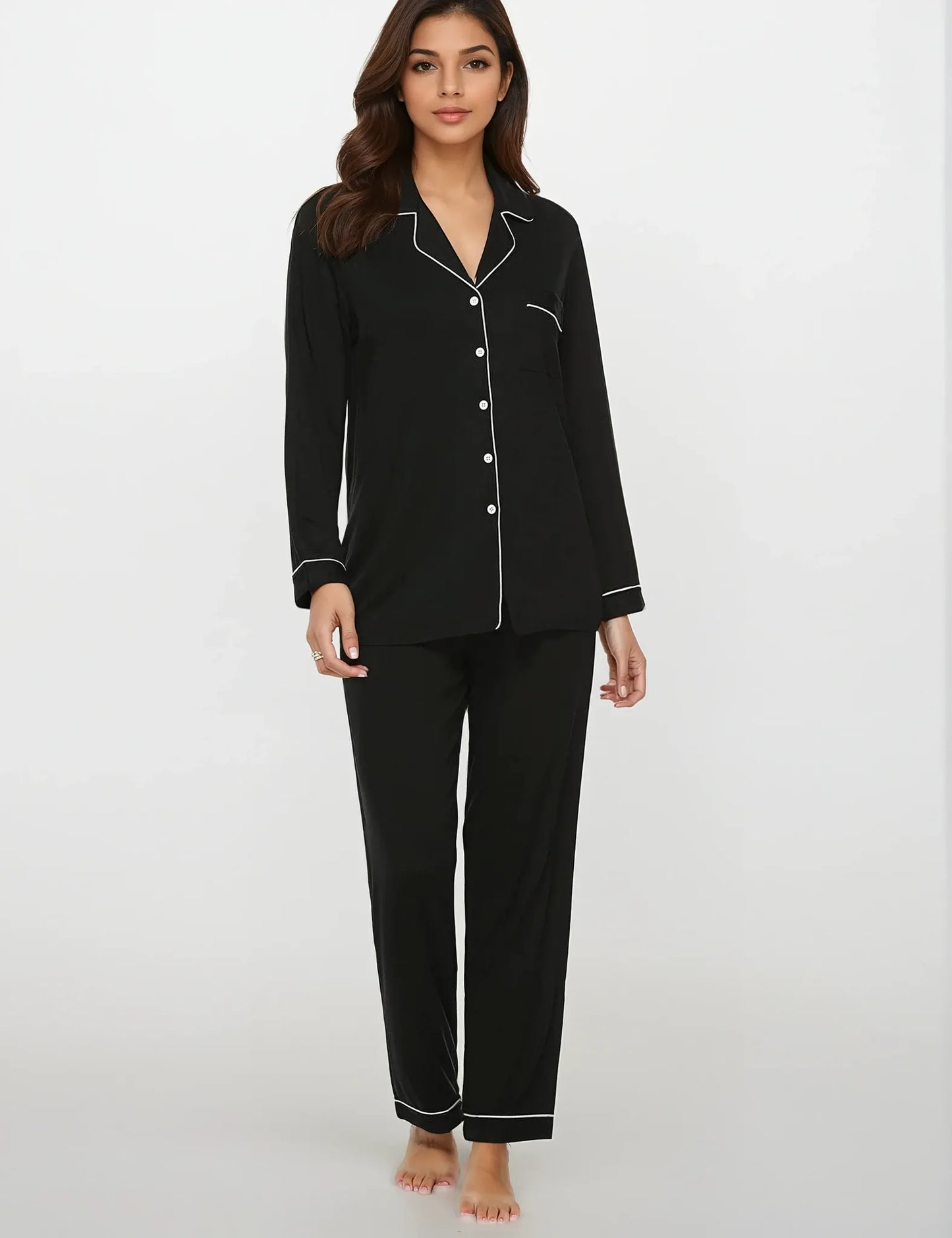 Model walking in black bamboo loungewear set – premium modal-blend sleepwear for women by Prana Poshak