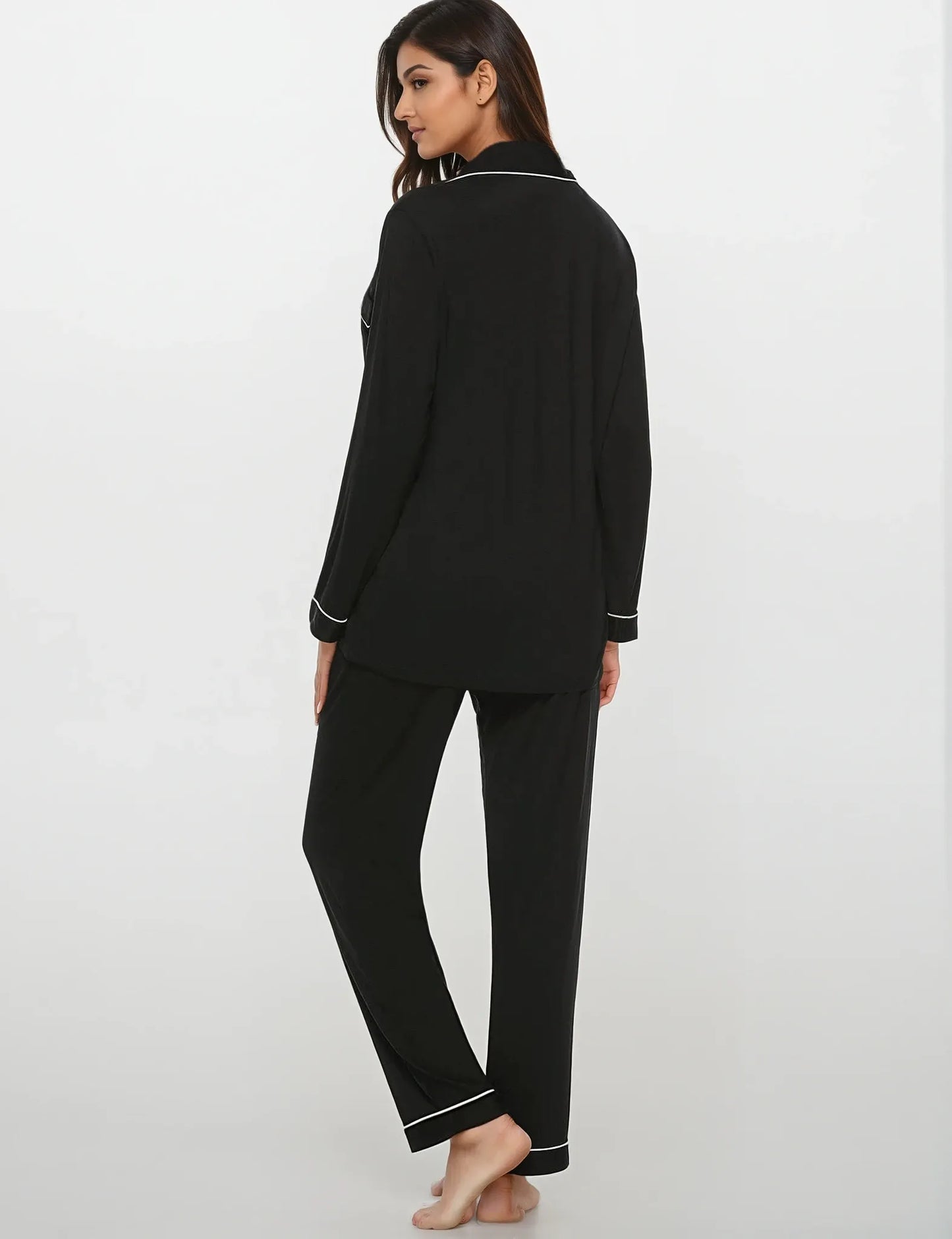 Side-back view of relaxed-fit bamboo pajama set in black – lightweight and elegant sleepwear by Prana Poshak