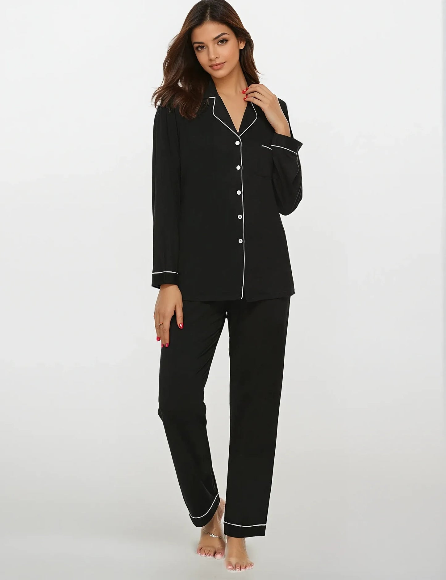 Model in black bamboo pajama set with contrast piping – ultra-soft and breathable nightwear by Prana Poshak