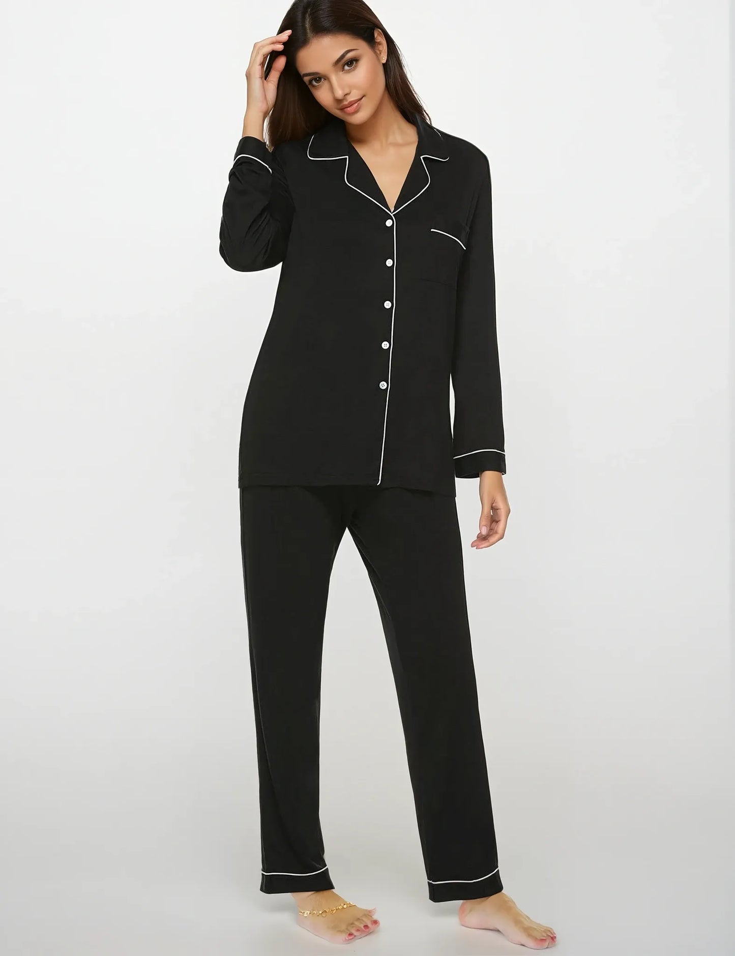 Stylish black pajama set made from bamboo fabric – soft-touch nightwear with feminine detailing by Prana Poshak