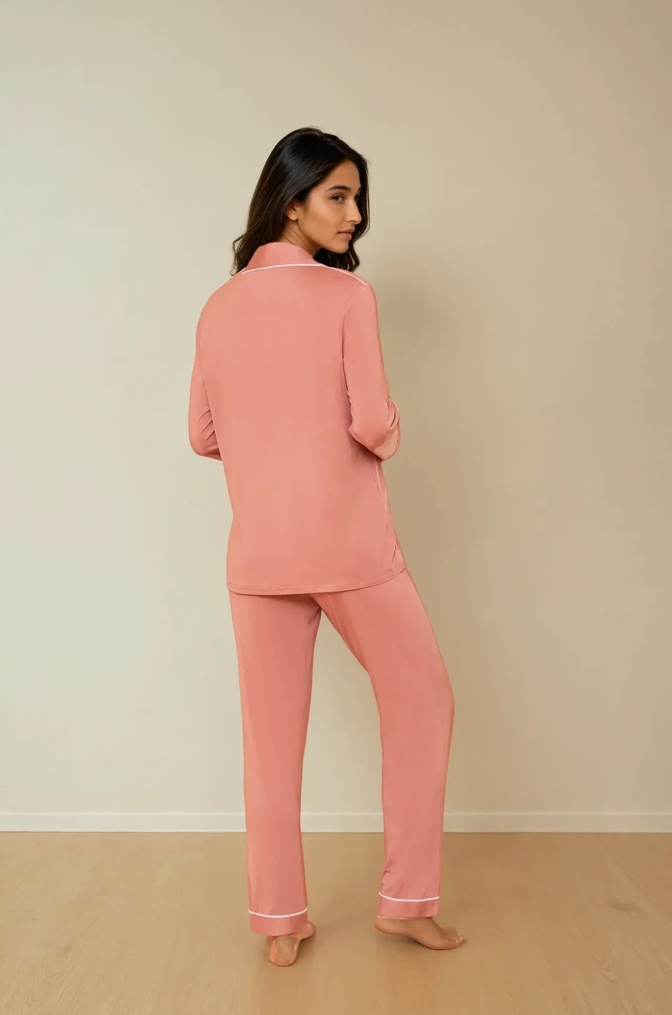 Back view of Prana Poshak's Cinnamon Pink bamboo pajama set, displaying the straight-cut design and comfortable fit