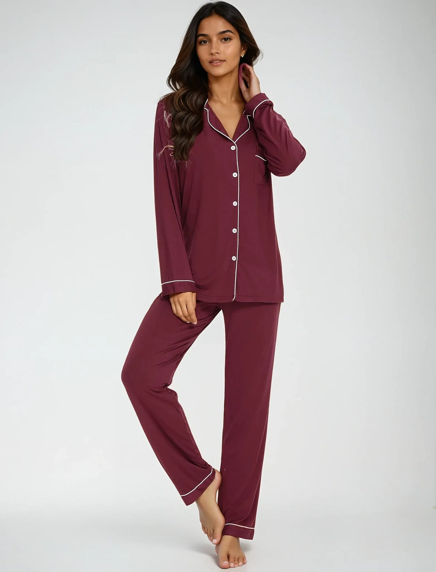 Model standing in maroon bamboo nightwear set – button-down shirt with classic piping, perfect for lounging by Prana Poshak