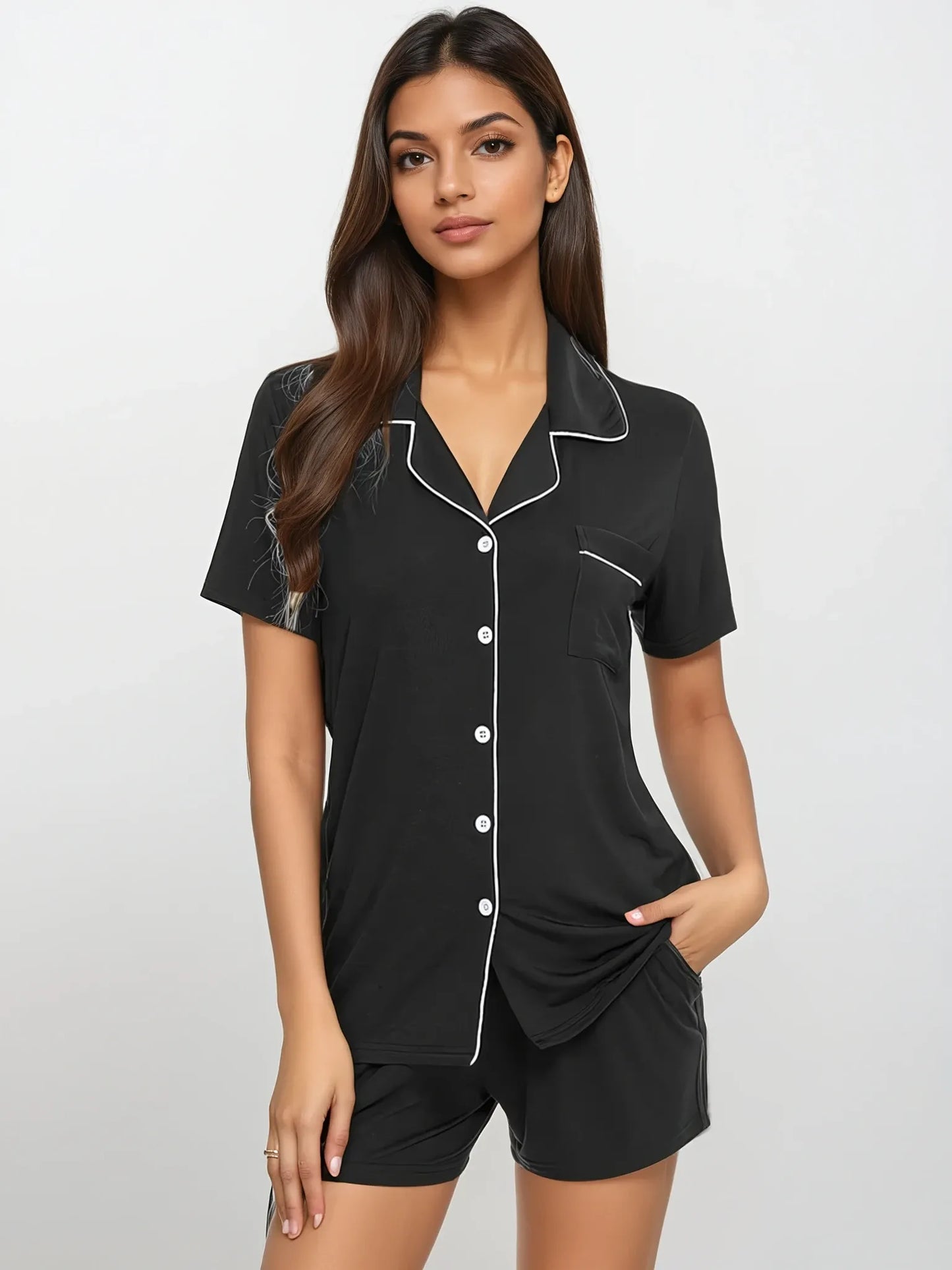 Elegant front-facing look of black bamboo pajama set by Prana Poshak – tailored collar and soft-touch shorts