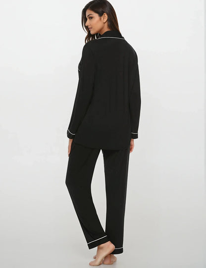 Side-back view of relaxed-fit bamboo pajama set in black – lightweight and elegant sleepwear by Prana Poshak