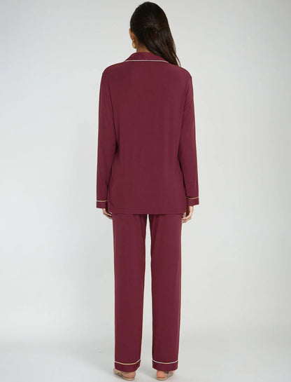 Back view of women’s maroon pajama set – elegant long-sleeve nightwear with clean piping detail by Prana Poshak