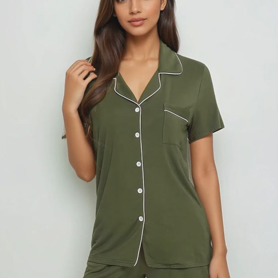 Model in olive and army  green bamboo short set walking and posing – soft, lightweight nightwear for women by Prana Poshak
