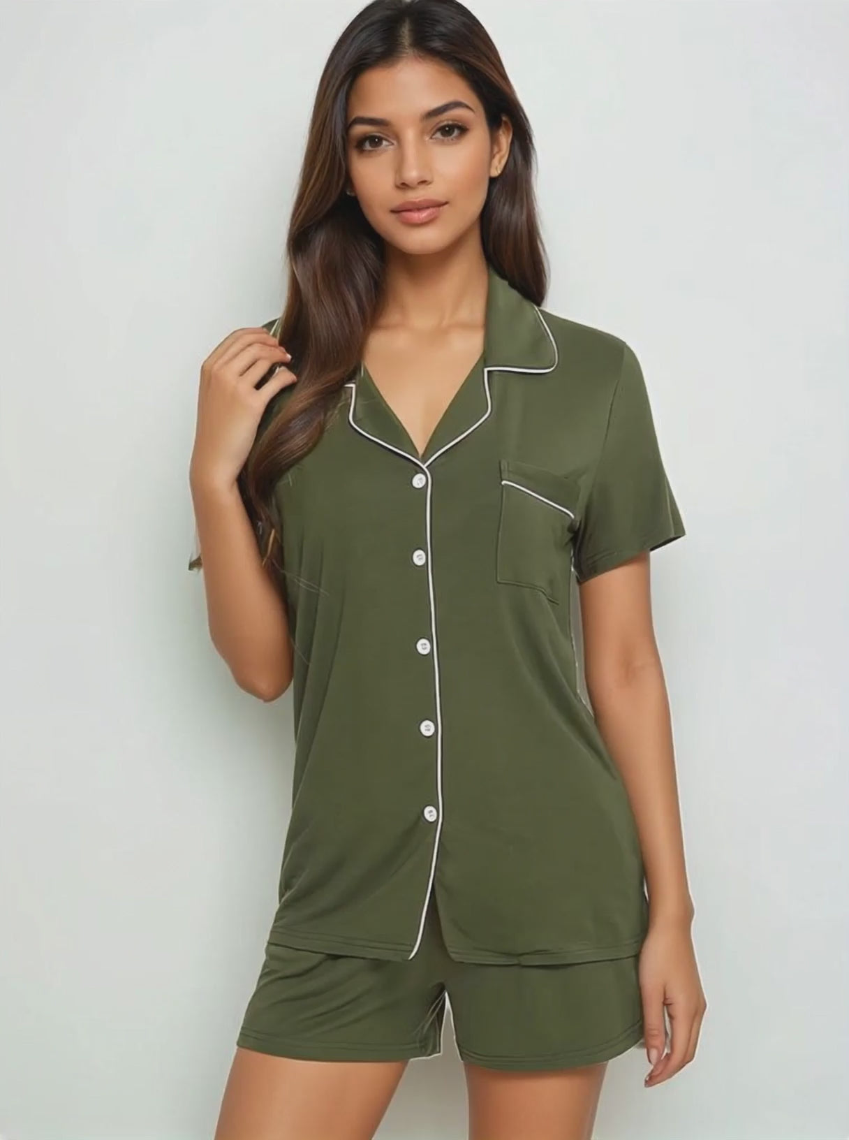 Model in olive and army  green bamboo short set walking and posing – soft, lightweight nightwear for women by Prana Poshak